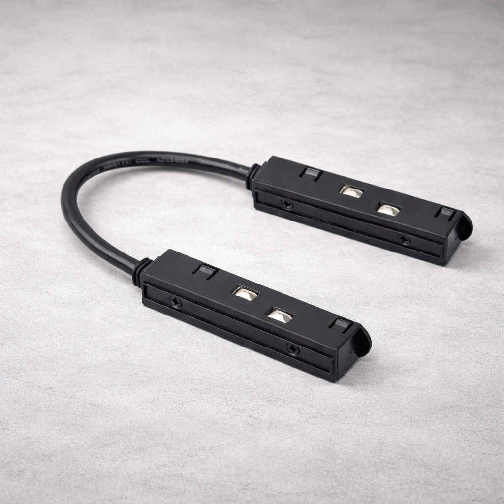 Aplicación de conector flexible en L creando giro de 90 grados en sistema de iluminación